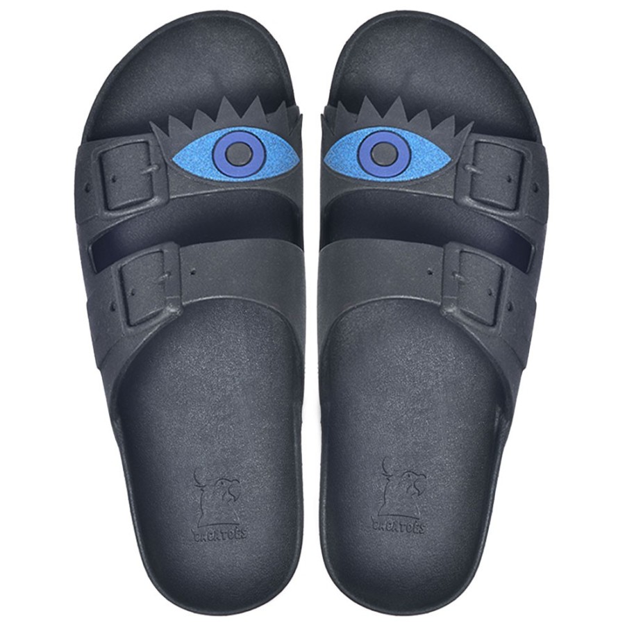 sandales noires patch oeil bleu vues de haut